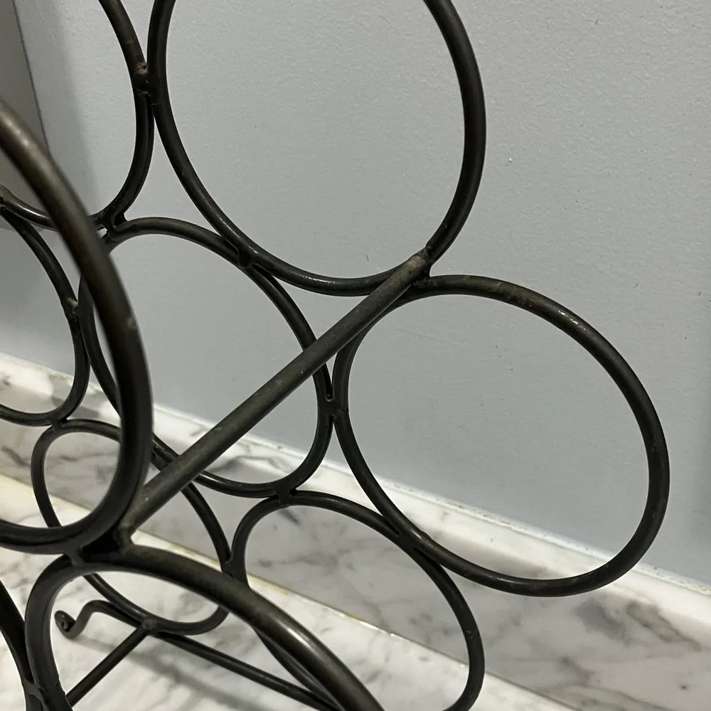 Gray Metal Wine Rack- 7 bottle, free standing, honeycomb style, circular, 4 legs